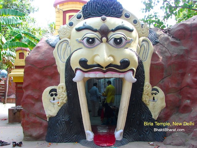 Shiv mandir with large demon face as entry gate Shiv mandir with large demon face as entry gate