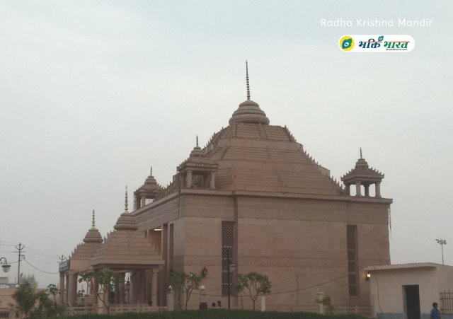 A full view of the temple from right sided green area. Maintaining tradition facility of drinking water using hand pump with attached park. A full view of the temple from right sided green area. Maintaining tradition facility of drinking water using hand pump with attached park.