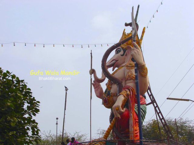 Lambodaraya Pratham Shri Ganesh big high murti having astra-shastra like Dhanus, Gada and Trishul (धनुष, गदा, त्रिशूल)  with His sawari (ride) holy Musak Raj, Other side of Shri Hanumant Lal murti.