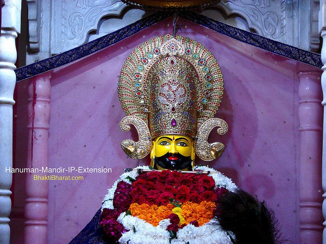 On front left corner, Baba Shri Shyam Darbar decorated with beautiful blue, yellow and white flowers.