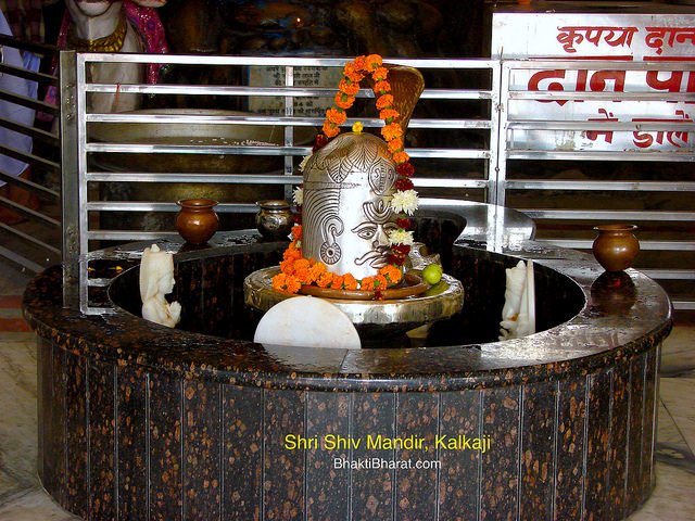 Silver cotted Shivling with Gan in the middle of the temple with Nageshwar Mahadev vigrah.